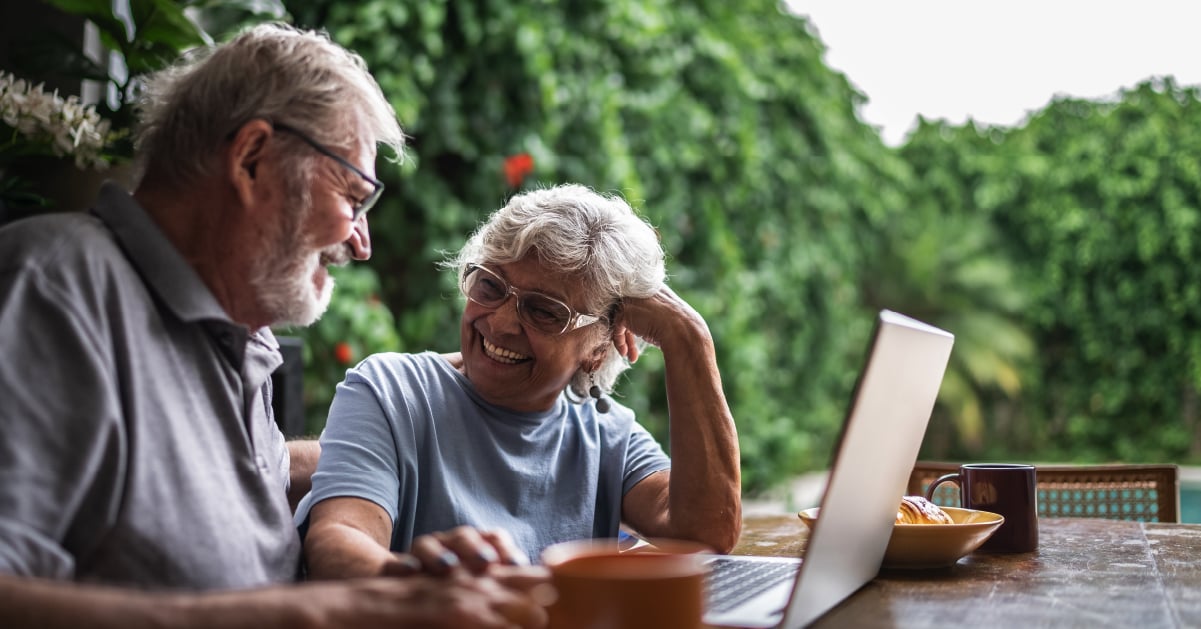 Senior couple researching independent living communities