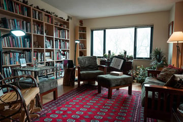 walker place living room with bookcase
