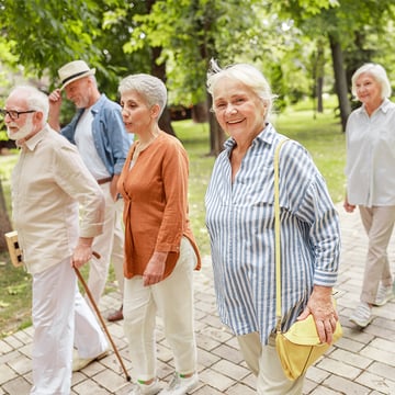 seniors walking in park