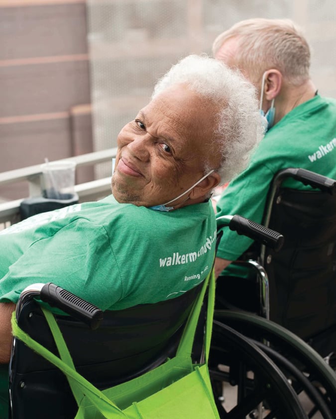 senior woman in wheelchair smiling